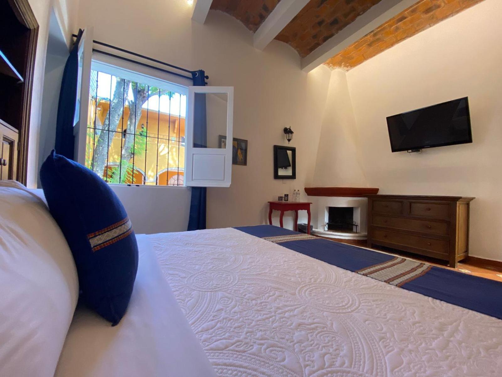 Hotel Hacienda Monteverde Альенде Номер фото