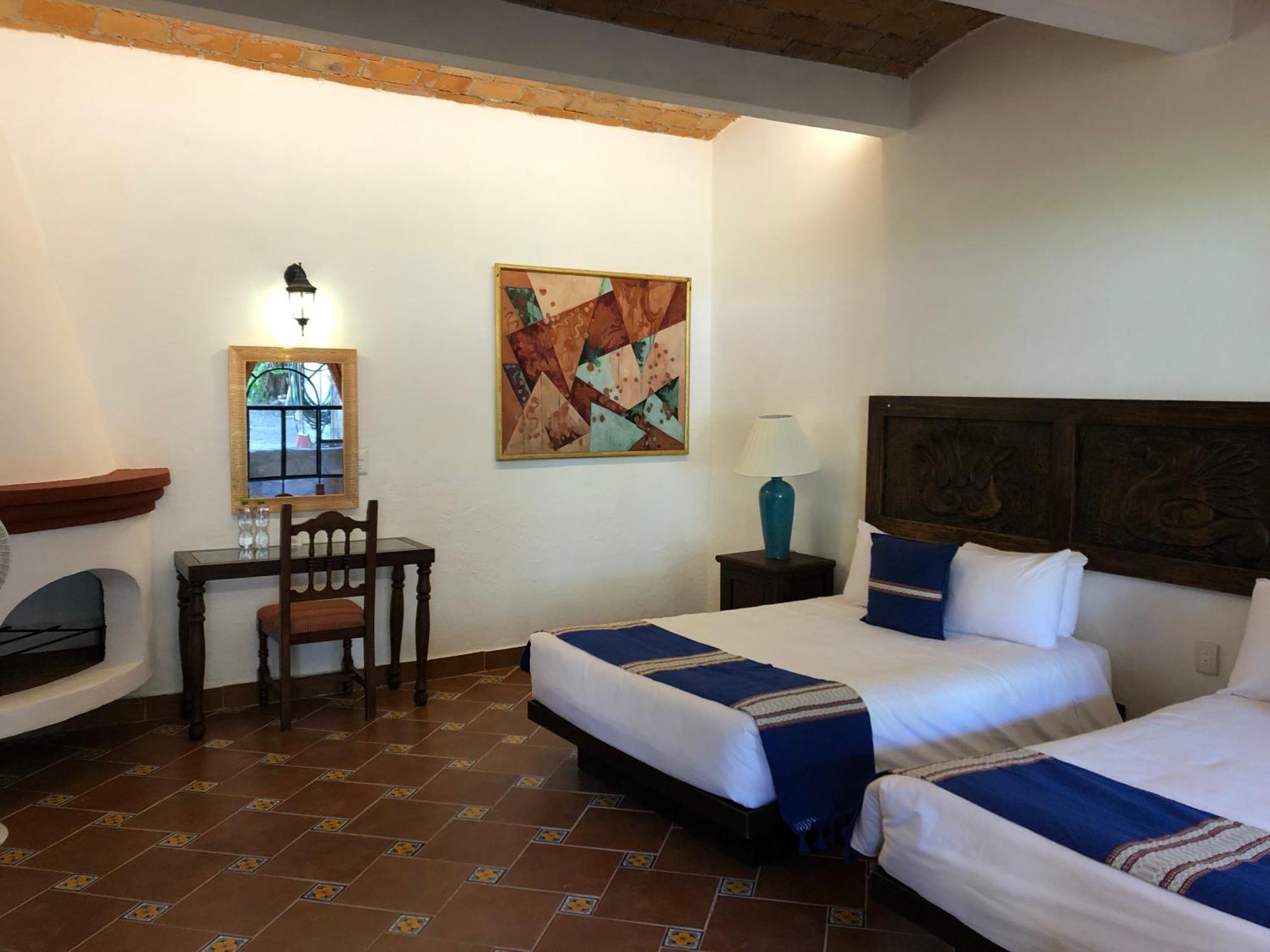 Hotel Hacienda Monteverde Альенде Номер фото